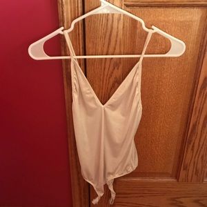 Cream shimmer V body suit